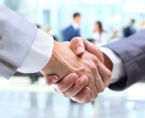 Business handshake and business people